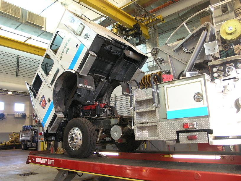 vehicle with bed raised